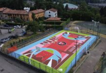 Un pezzo di storia passata per uno di quella futura: la canotta di Meneghin per il campetto esterno del Campus