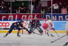 Cuore rossoblù e bolgia alla Fiera: Milano spaventa la capolista Bolzano, ma la beffa arriva all’overtime (3-4)